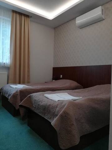 Фото номера Двухместный номер с 2 отдельными кроватями Мотели Gościnny Gaj г. Gaj 4