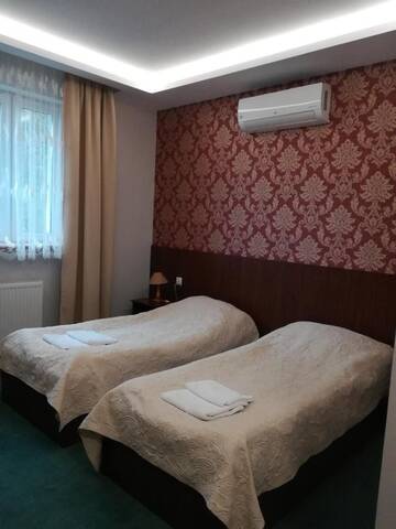 Фото номера Двухместный номер с 2 отдельными кроватями Мотели Gościnny Gaj г. Gaj 5